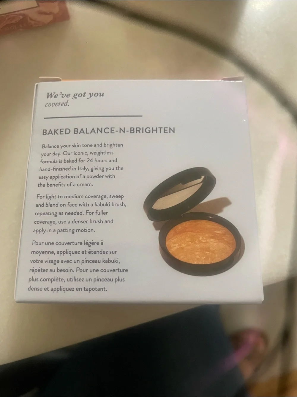 Laura Geller baked balance-n-brighten color correcting powder foundation LIGHT